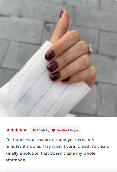 Joanna F.'s supplier review photo of a burgundy manicure